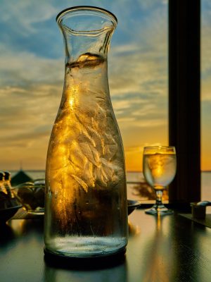 Ice water carafe with sunset